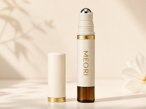 Meori Scalp Roll-On in matte ivory and metallic gold